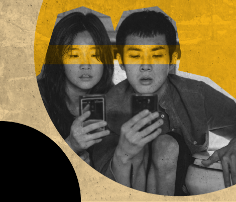 two teens playing on their phones