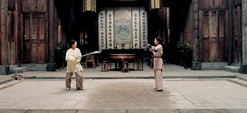 two women sword fighting