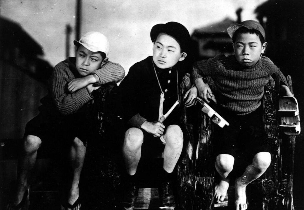 three boys sitting